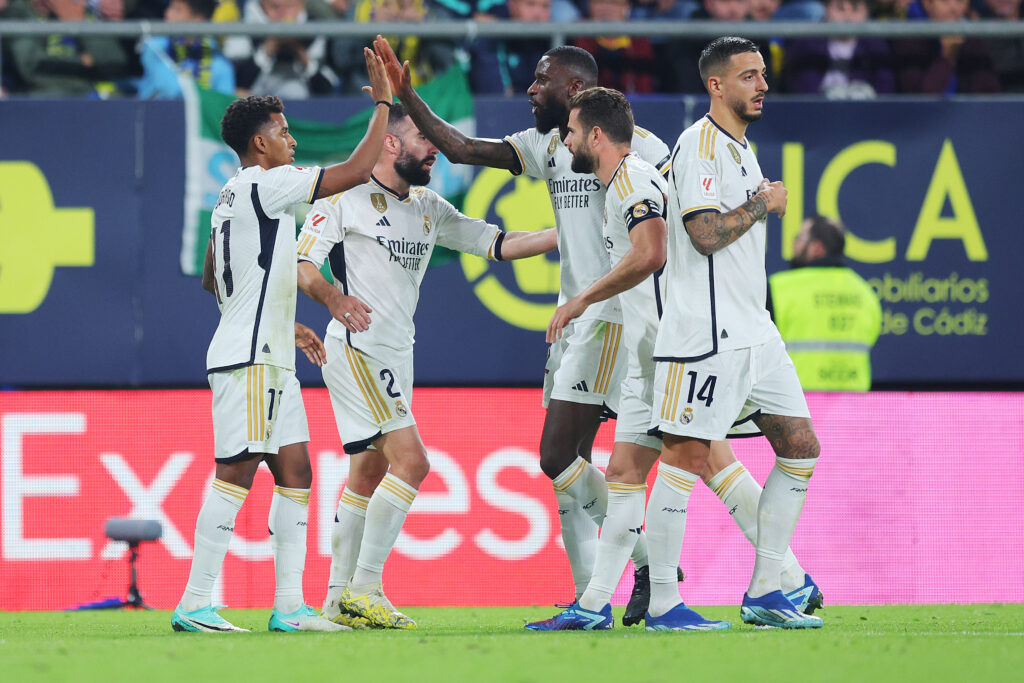 CADIZ, SPAIN - NOVEMBER 26: Rodrygo of Real Madrid (L) celebrates with teammates Daniel Carvajal (2L), Antonio Ruediger (C), Nacho Fernandez (2R) and Joselu after scoring the team's second goal during the LaLiga EA Sports match between Cadiz CF and Real Madrid CF at Estadio Nuevo Mirandilla on November 26, 2023 in Cadiz, Spain.