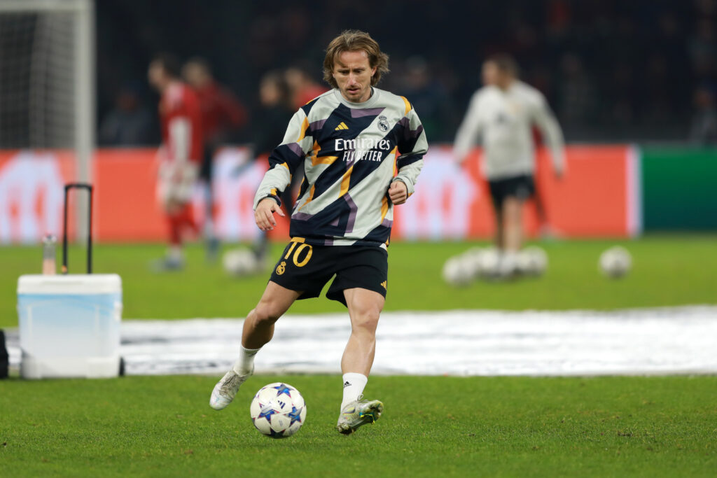 BERLIN, GERMANY - DECEMBER 12: Luka Modric of Real Madrid warms up during the UEFA Champions League match between 1. FC Union Berlin and Real Madrid CF at Olympiastadion on December 12, 2023 in Berlin, Germany.