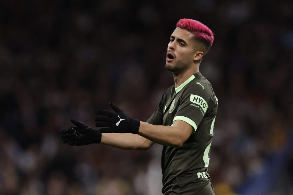 Girona's Brazilian defender #20 Yan Couto reacts during the Spanish league football match between Real Madrid CF and Girona FC at the Santiago Bernabeu stadium in Madrid on February 10, 2024.