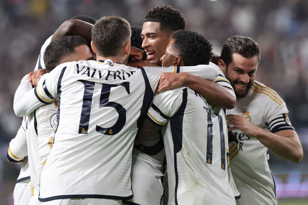 Real Madrid's players celebrate their second goal during the Spanish Super Cup semi-final football match between Real Madrid and Atletico Madrid at the Al-Awwal Park Stadium in Riyadh, on January 10, 2024.