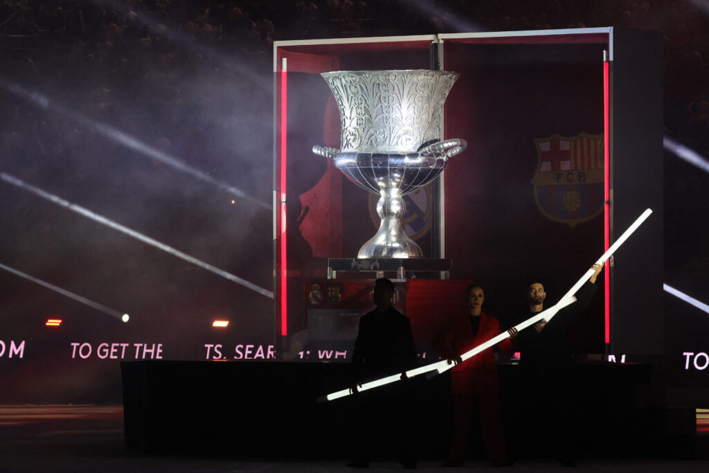 A giant replica of the Spanish Super Cup Trophy is displayed ahead of the Spanish Super Cup final football match between Real Madrid and Barcelona at the Al-Awwal Park Stadium in Riyadh, on January 14, 2024.