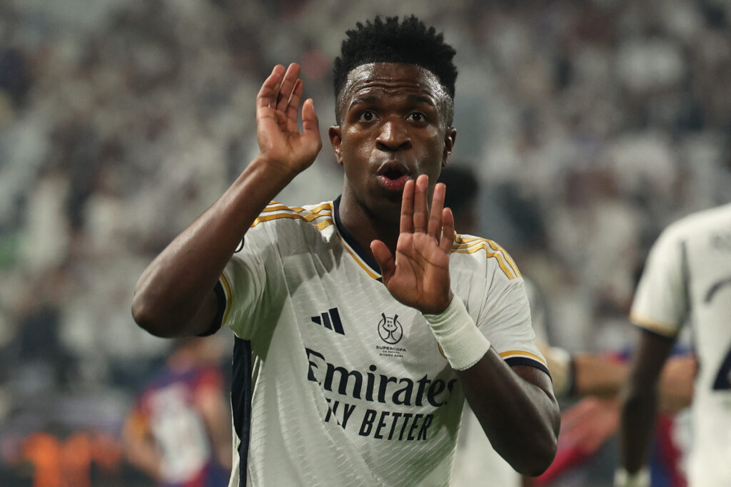 Real Madrid's Brazilian forward #07 Vinicius Junior celebrates after scoring his team's first goal during the Spanish Super Cup final football match between Real Madrid and Barcelona at the Al-Awwal Park Stadium in Riyadh, on January 14, 2024.