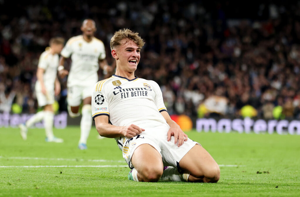 MADRID, SPAIN - NOVEMBER 29: Nico Paz of Real Madrid celebrates after scoring the team's third goal during the UEFA Champions League match between Real Madrid and SSC Napoli at Estadio Santiago Bernabeu on November 29, 2023 in Madrid, Spain.