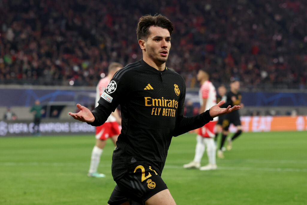 LEIPZIG, GERMANY - FEBRUARY 13: Brahim Diaz of Real Madrid celebrates scoring his team's first goal during the UEFA Champions League 2023/24 round of 16 first leg match between RB Leipzig and Real Madrid CF at Red Bull Arena on February 13, 2024 in Leipzig, Germany.