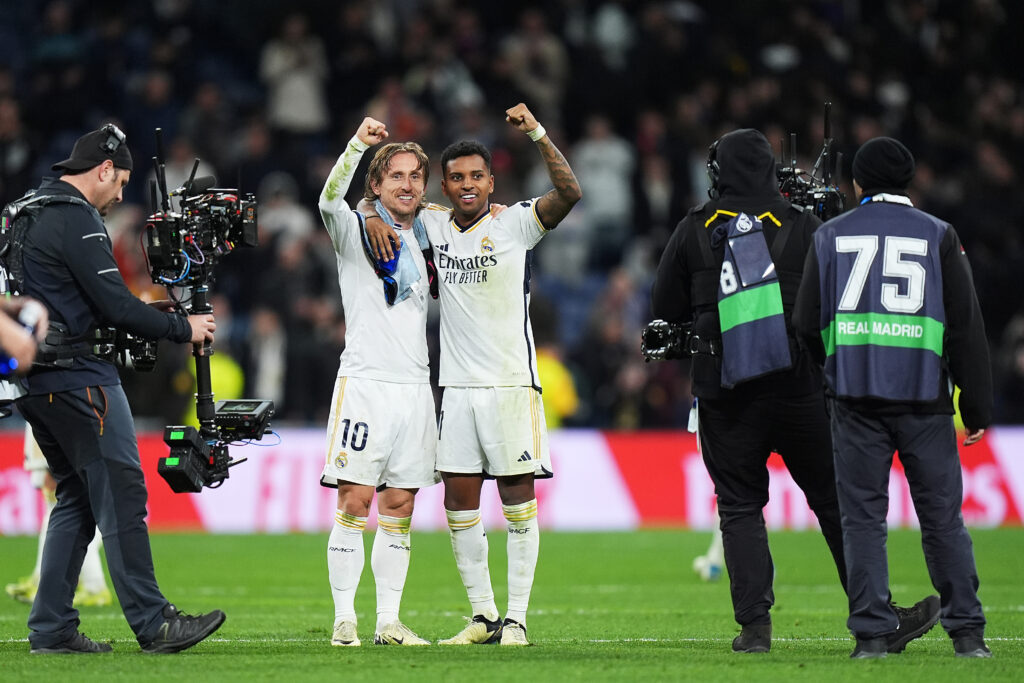 MADRID, SPAIN - FEBRUARY 25: Luka Modric and Rodrygo of Real Madrid celebrate after the team's victory in the LaLiga EA Sports match between Real Madrid CF and Sevilla FC at Estadio Santiago Bernabeu on February 25, 2024 in Madrid, Spain.