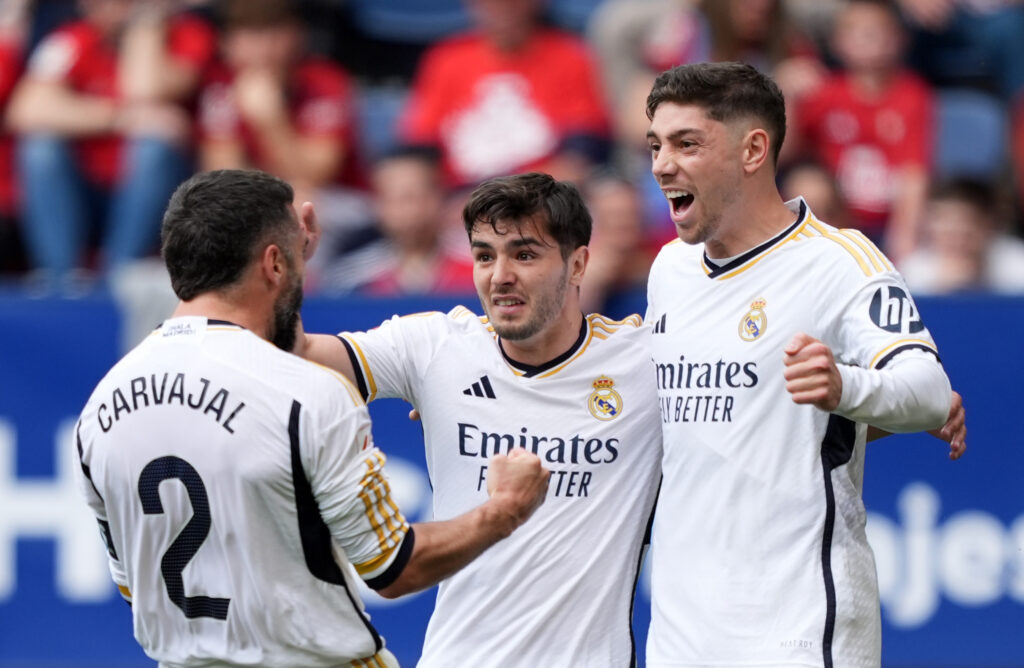 PAMPLONA, SPAIN - MARCH 16: Daniel Carvajal of Real Madrid celebrates scoring his team's second goal with teammates Brahim Diaz and Federico Valverde during the LaLiga EA Sports match between CA Osasuna and Real Madrid CF at Estadio El Sadar on March 16, 2024 in Pamplona, Spain.