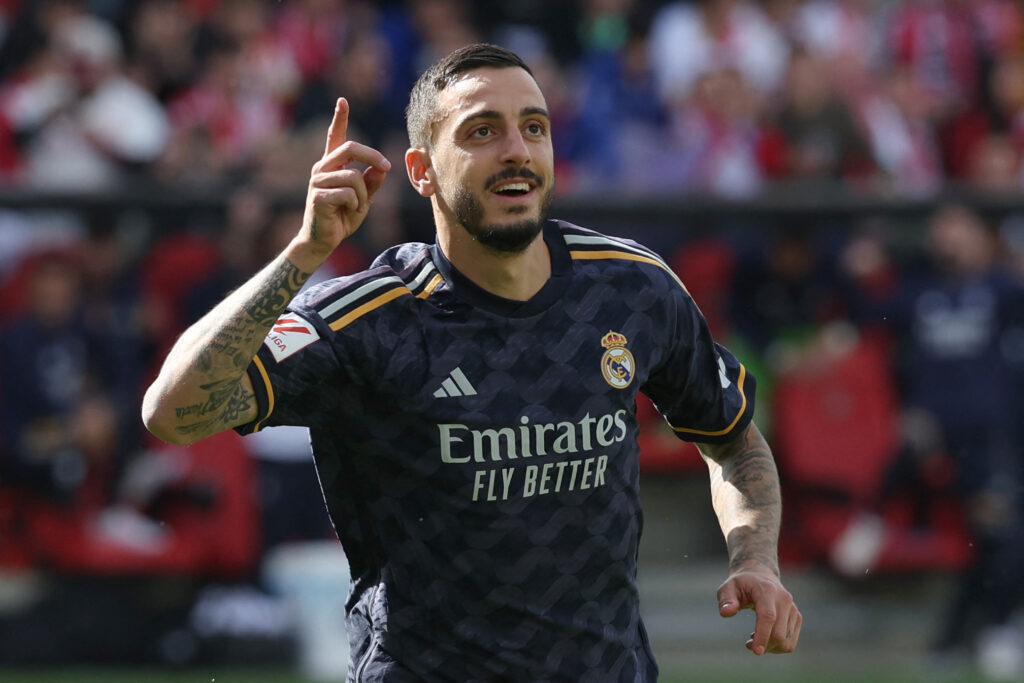 Real Madrid's Spanish forward #14 Joselu celebrates scoring his team's first goal during the Spanish league football match Rayo Vallecano de Madrid and Real Madrid CF at the Vallecas stadium in Madrid on February 18, 2024.