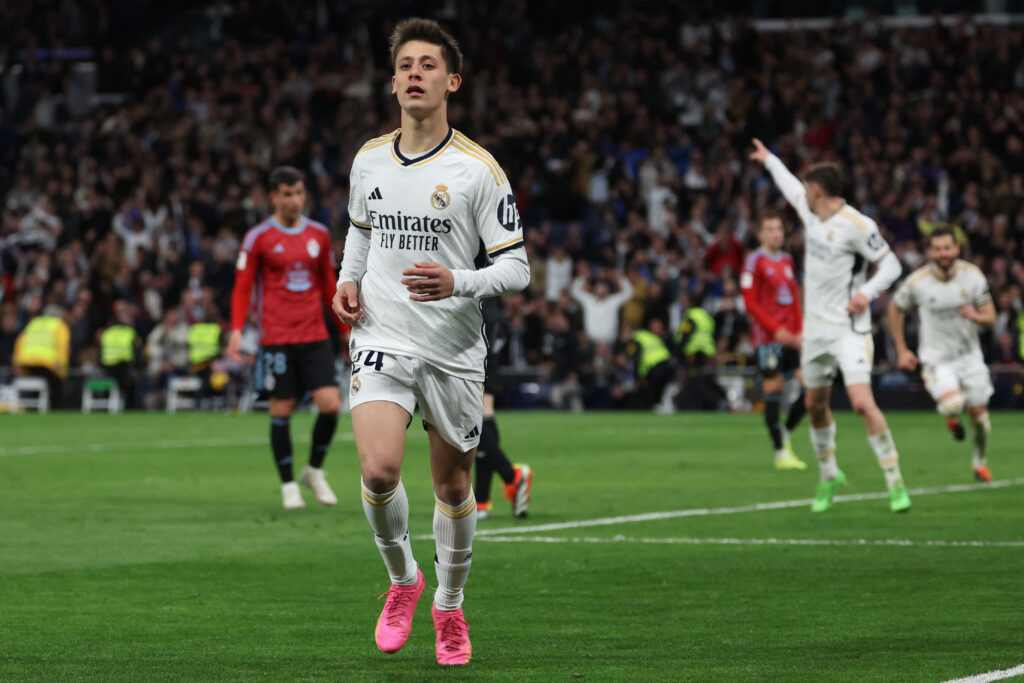 Real Madrid's Turkish midfielder #24 Arda Guler celebrates scoring his team's fourth goal during the Spanish league football match between Real Madrid CF and RC Celta de Vigo at the Santiago Bernabeu stadium in Madrid on March 10, 2024.