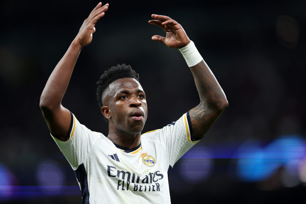 MADRID, SPAIN - MARCH 06: Vinicius Junior of Real Madrid reacts during the UEFA Champions League 2023/24 round of 16 second leg match between Real Madrid CF and RB Leipzig at Estadio Santiago Bernabeu on March 06, 2024 in Madrid, Spain.