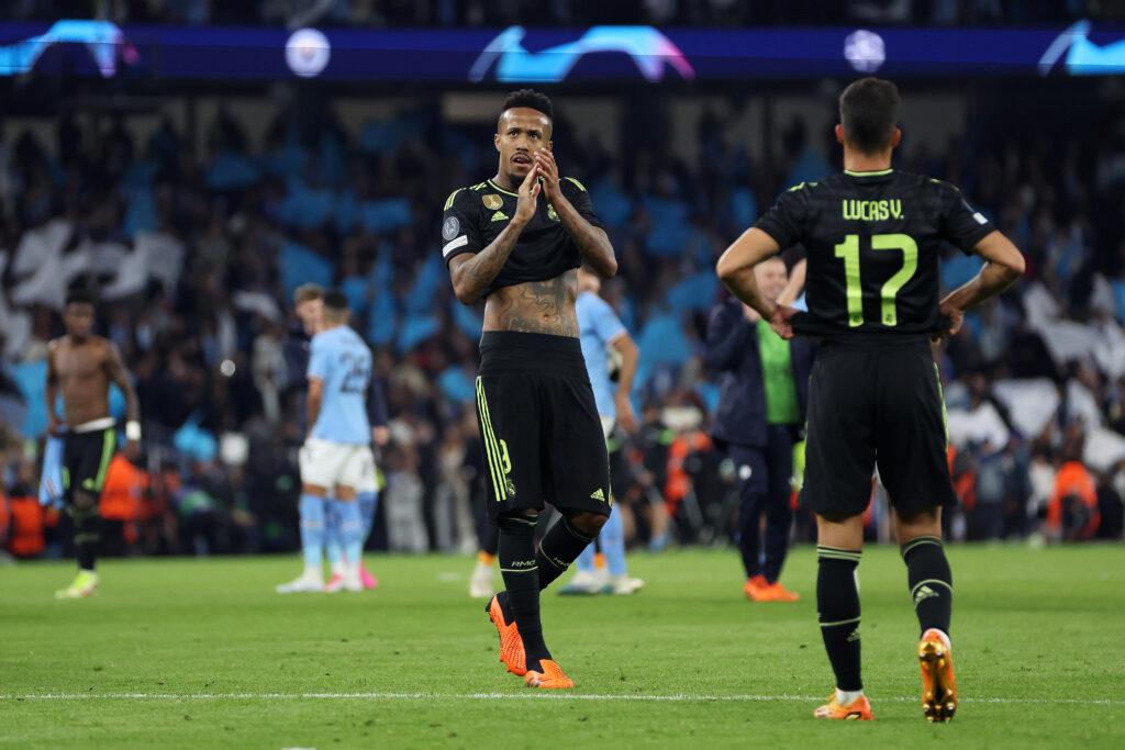 MANCHESTER, ENGLAND - MAY 17: Eder Militao of Real Madrid applauds the fans after the team's defeat during the UEFA Champions League semi-final second leg match between Manchester City FC and Real Madrid at Etihad Stadium on May 17, 2023 in Manchester, England.