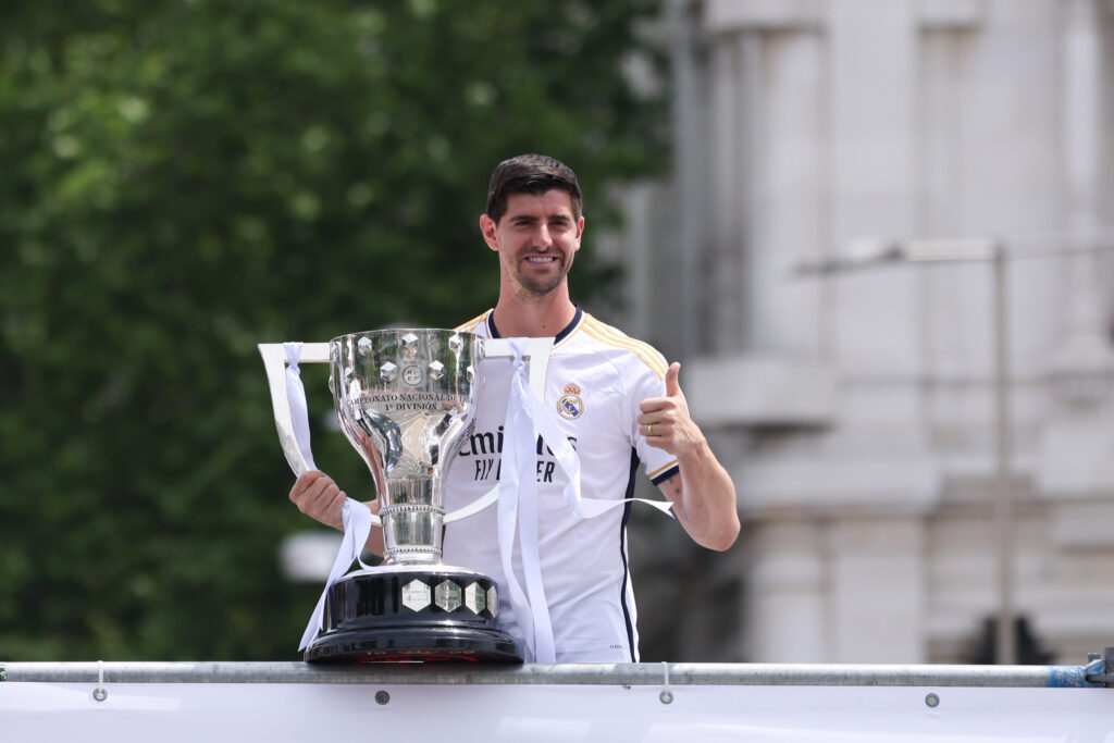 MADRID, SPAIN - MAY 12: Thibaut Courtois of Real Madrid CF poses with the trophy during the celebration of the 36th Spanish soccer league at Cibeles on May 12, 2024 in Madrid, Spain.