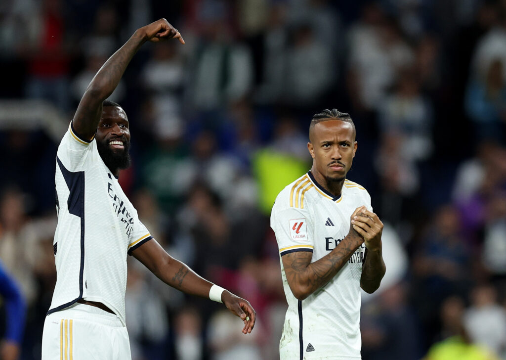 MADRID, SPAIN - MAY 14: Antonio Ruediger of Real Madrid celebrates with teammate Eder Militao after the team's victory in the LaLiga EA Sports match between Real Madrid CF and Deportivo Alaves at Estadio Santiago Bernabeu on May 14, 2024 in Madrid, Spain.