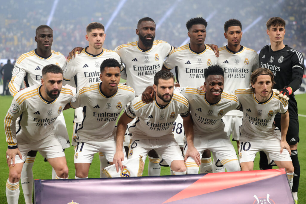 (Top L to R) Real Madrid's French defender #23 Ferland Mendy, Real Madrid's Uruguayan midfielder #15 Federico Valverde, Real Madrid's German defender #22 Antonio Rudiger, Real Madrid's French defender #18 Aurelien Tchouameni, Real Madrid's English midfielder #5 Jude Bellingham, Real Madrid's Spanish goalkeeper #25 Kepa Arrizabalaga, (bottom L to R) Real Madrid's Spanish defender #02 Dani Carvajal, Real Madrid's Brazilian forward #11 Rodrygo, Real Madrid's Spanish defender #06 Nacho Fernandez, Real Madrid's Brazilian forward #07 Vinicius Junior and Real Madrid's Croatian midfielder #10 Luka Modric pose for a team picture during the Spanish Super Cup semi-final football match between Real Madrid and Atletico Madrid at the Al-Awwal Park Stadium in Riyadh, on January 10, 2024.