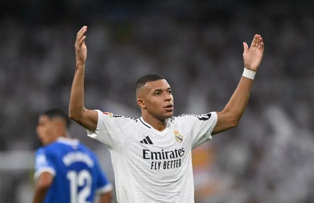 MADRID, SPAIN - SEPTEMBER 24: Kylian Mbappe of Real Madrid celebrates scoring his team's second goal during the LaLiga match between Real Madrid CF and Deportivo Alaves at Estadio Santiago Bernabeu on September 24, 2024 in Madrid, Spain.