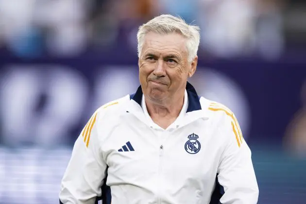 EAST RUTHERFORD, NEW JERSEY - AUGUST 3: Carlo Ancelotti, head coach of Real Madrid walks onto the pitch before in the pre-season friendly match against the FC Barcelona at MetLife Stadium on August 3, 2024 in East Rutherford, New Jersey.