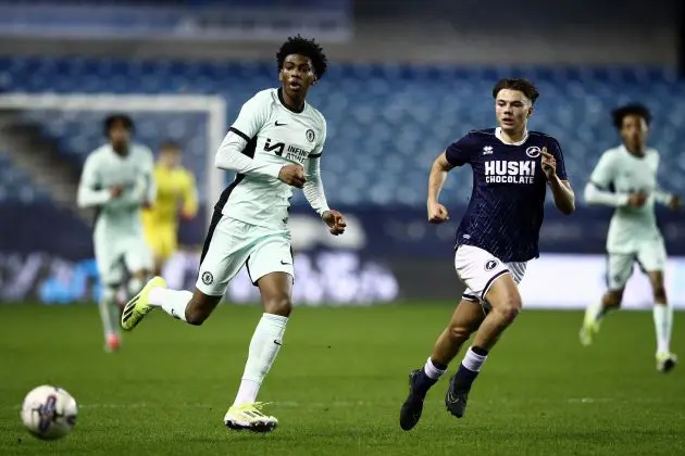 LONDON, ENGLAND - FEBRUARY 21: Josh-Kofi Acheampong of Chelsea passes the ball whilst under pressure from Frankie Maciocia of Millwall during the FA Youth Cup Quarter-Final match between Millwall U18 and Chelsea U18 at The Den on February 21, 2024 in London, England.