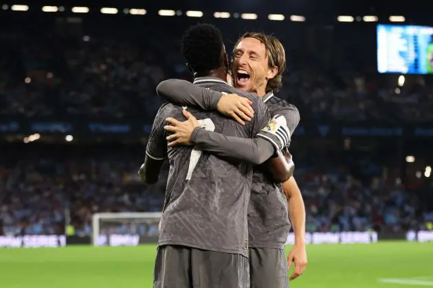 VIGO, SPAIN - OCTOBER 19: Vinicius Junior of Real Madrid celebrates scoring his team's second goal with Luka Modric during the LaLiga match between RC Celta de Vigo and Real Madrid CF at Estadio de Balaidos on October 19, 2024 in Vigo, Spain.