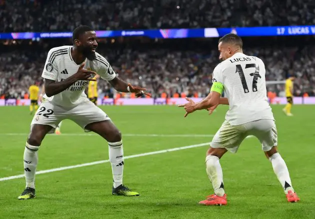 MADRID, SPAIN - OCTOBER 22: Lucas Vazquez of Real Madrid celebrates with teammate Antonio Ruediger after scoring his team's third goal during the UEFA Champions League 2024/25 League Phase MD3 match between Real Madrid C.F. and Borussia Dortmund at Estadio Santiago Bernabeu on October 22, 2024 in Madrid, Spain.