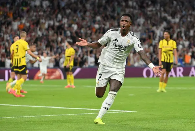 MADRID, SPAIN - OCTOBER 22: Vinicius Junior of Real Madrid celebrates scoring his team's second goal during the UEFA Champions League 2024/25 League Phase MD3 match between Real Madrid C.F. and Borussia Dortmund at Estadio Santiago Bernabeu on October 22, 2024 in Madrid, Spain.