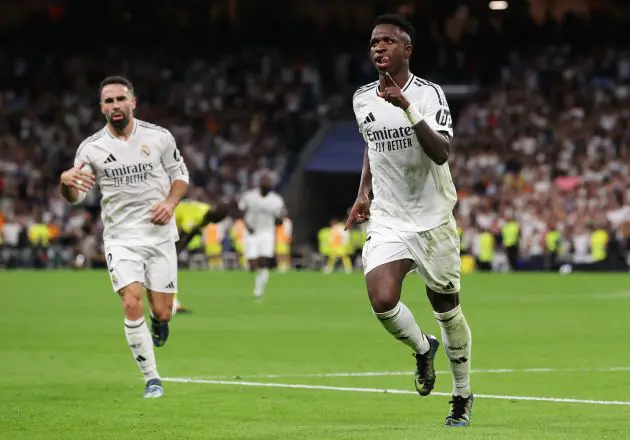 MADRID, SPAIN - OCTOBER 05: Vinicius Junior of Real Madrid celebrates scoring his team's second goal during the LaLiga match between Real Madrid CF and Villarreal CF at Estadio Santiago Bernabeu on October 05, 2024 in Madrid, Spain.