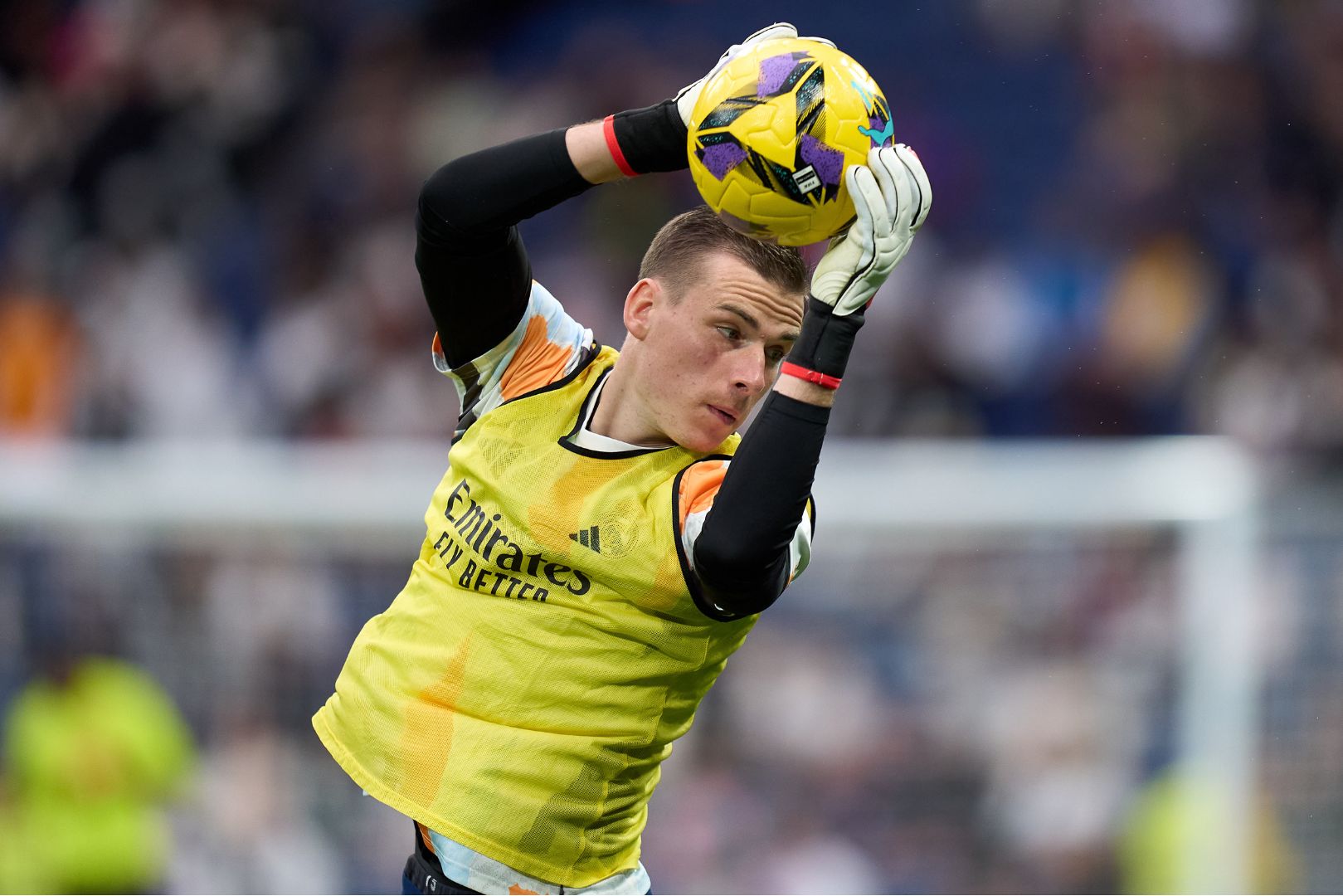 MADRID, SPAIN - FEBRUARY 23: Andriy Lunin of Real Madrid warms up prior to the LaLiga match between Real Madrid CF and Girona FC at Estadio Santiago Bernabeu on February 23, 2025 in Madrid, Spain.