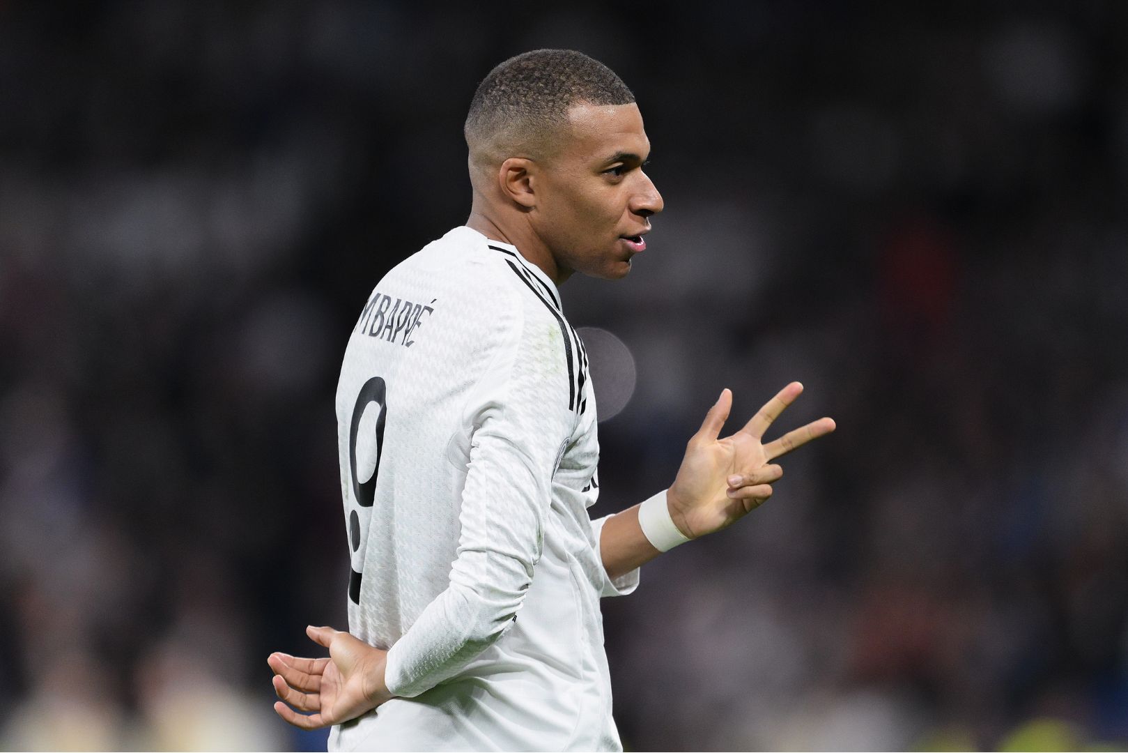 MADRID, SPAIN - FEBRUARY 19: Kylian Mbappe of Real Madrid celebrates scoring his team's third goal and his hat trick during the UEFA Champions League 2024/25 League Knockout Play-off second leg match between Real Madrid C.F. and Manchester City at Santiago Bernabeu Stadium on February 19, 2025 in Madrid, Spain.