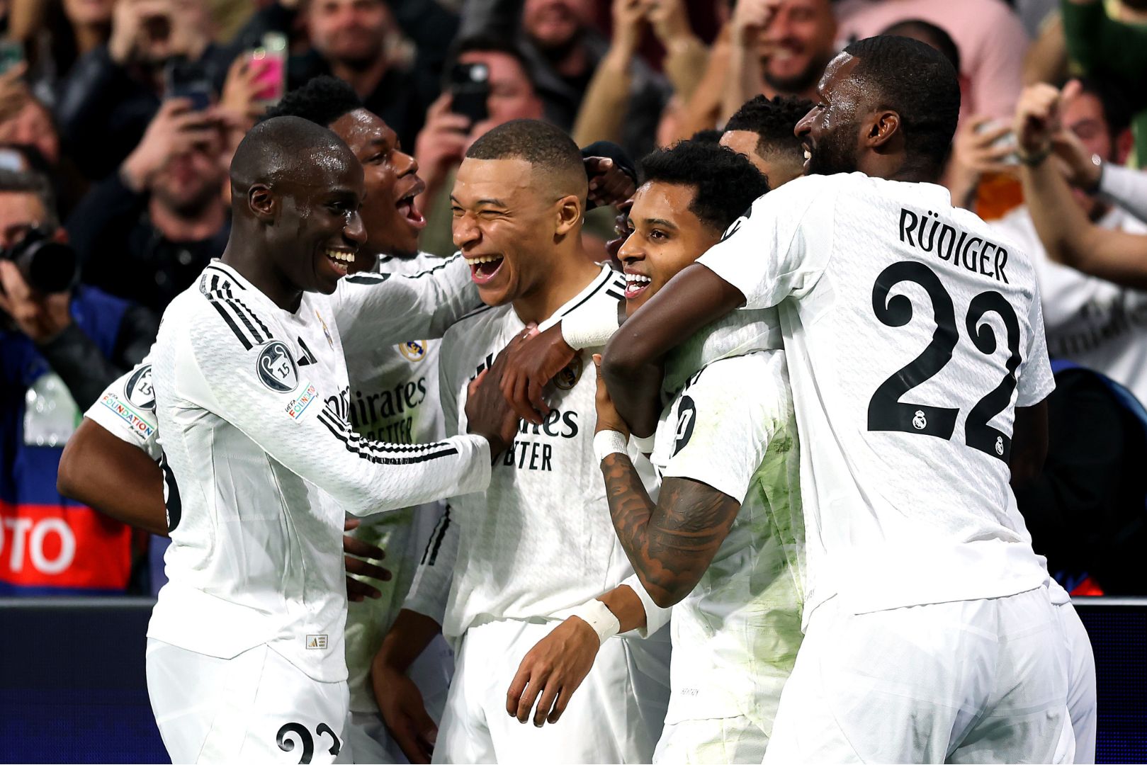 MADRID, SPAIN - FEBRUARY 19: Kylian Mbappe celebrates scoring his team's second goal with teammates Ferland Mendy, Aurelien Tchouameni, Rodrygo and Antonio Ruediger of Real Madrid during the UEFA Champions League 2024/25 League Knockout Play-off second leg match between Real Madrid C.F. and Manchester City at Santiago Bernabeu Stadium on February 19, 2025 in Madrid, Spain.