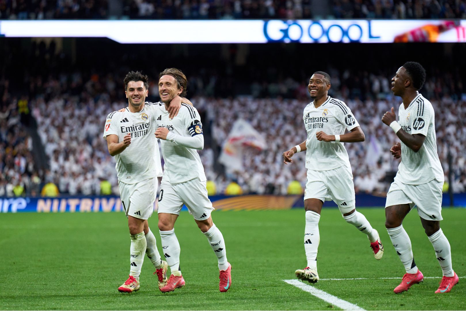 MADRID, SPAIN - FEBRUARY 23: Luka Modric of Real Madrid celebrates with Brahim Diaz after scoring the team's first goal during the LaLiga match between Real Madrid CF and Girona FC at Estadio Santiago Bernabeu on February 23, 2025 in Madrid, Spain.