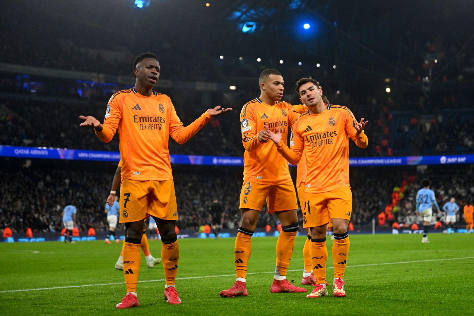 MANCHESTER, ENGLAND - FEBRUARY 11: Brahim Diaz of Real Madrid celebrates scoring his team's second goal with Vinicius Junior and Kylian Mbappe during the UEFA Champions League 2024/25 League Knockout Play-off first leg match between Manchester City and Real Madrid C.F. at Manchester City Stadium on February 11, 2025 in Manchester, England.