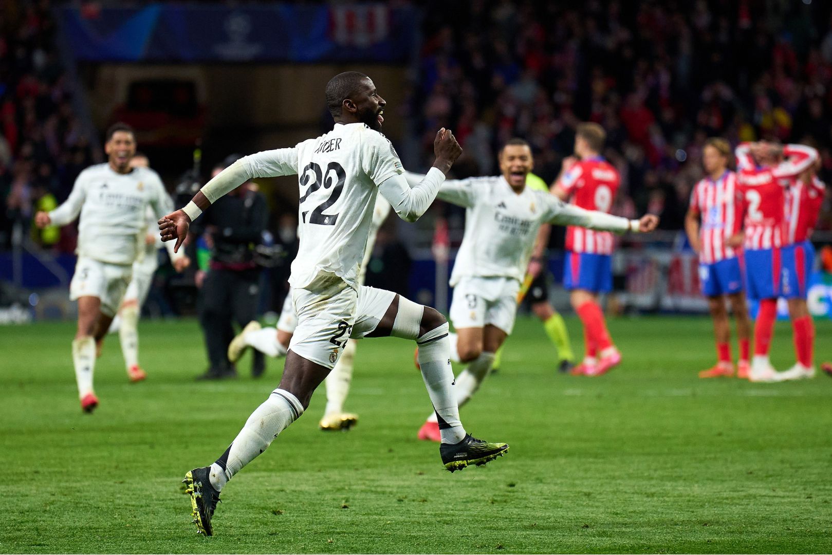 MADRID, SPAIN - MARCH 12: Antonio Ruediger of Real Madrid celebrates after scoring his sides fifth and winning penalty in the penalty shoot out during the UEFA Champions League 2024/25 UEFA Champions League 2024/25 Round of 16 second leg match between Atletico de Madrid and Real Madrid C.F. at Riyadh Air Metropolitano on March 12, 2025 in Madrid, Spain.