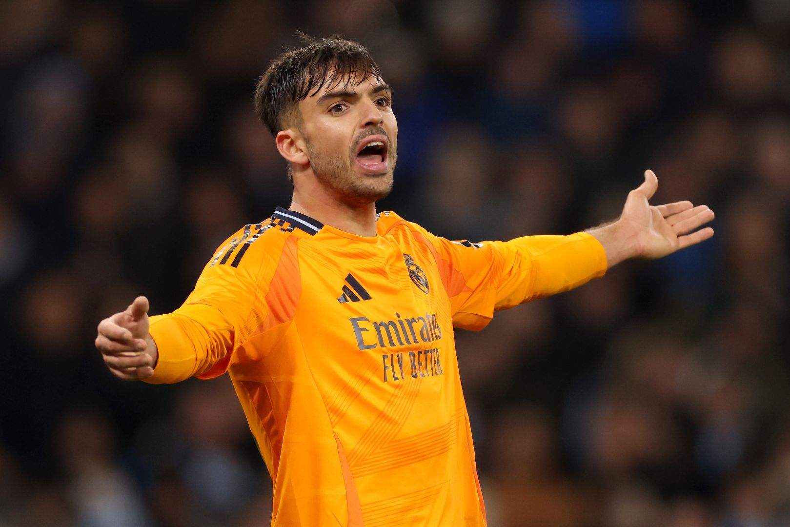 MANCHESTER, ENGLAND - FEBRUARY 11: Raul Asencio of Real Madrid reacts during the UEFA Champions League 2024/25 League Knockout Play-off first leg match between Manchester City and Real Madrid C.F. at Manchester City Stadium on February 11, 2025 in Manchester, England.