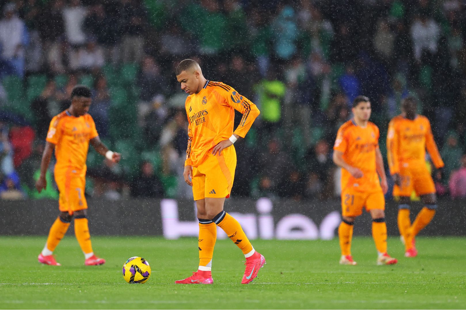 SEVILLE, SPAIN - MARCH 01: Kylian Mbappe of Real Madrid reacts after Isco of Real Betis (not pictured) scores his team's second goal from the penalty spot during the LaLiga match between Real Betis Balompie and Real Madrid CF at Estadio Benito Villamarin on March 01, 2025 in Seville, Spain.