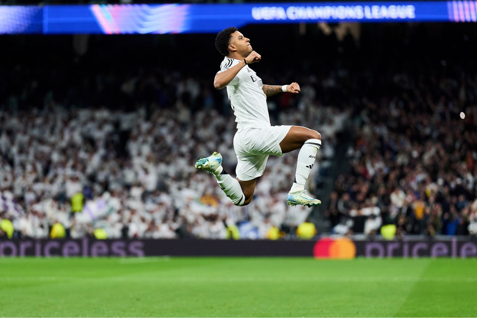 MADRID, SPAIN - MARCH 04: Rodrygo of Real Madrid celebrates scoring his team's first goal during the UEFA Champions League 2024/25 UEFA Champions League 2024/25 Round of 16 first leg match between Real Madrid C.F. and Atletico de Madrid at on March 04, 2025 in Madrid, Spain.